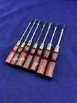 Vintage Champion Nut Driver Set 7PC Metric 4 11MM Wooden Handles. Fixed Price $100.00.